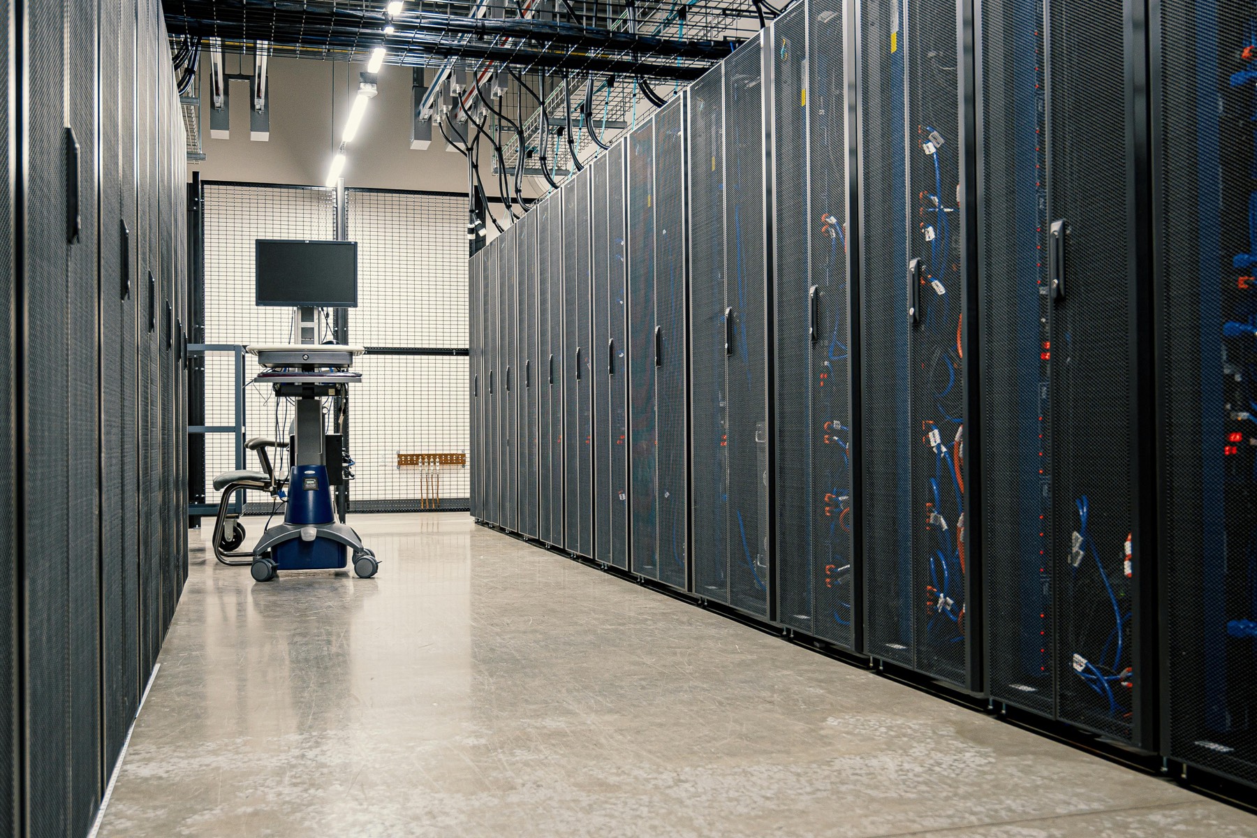 Server corridor with structured racks in a modern data center